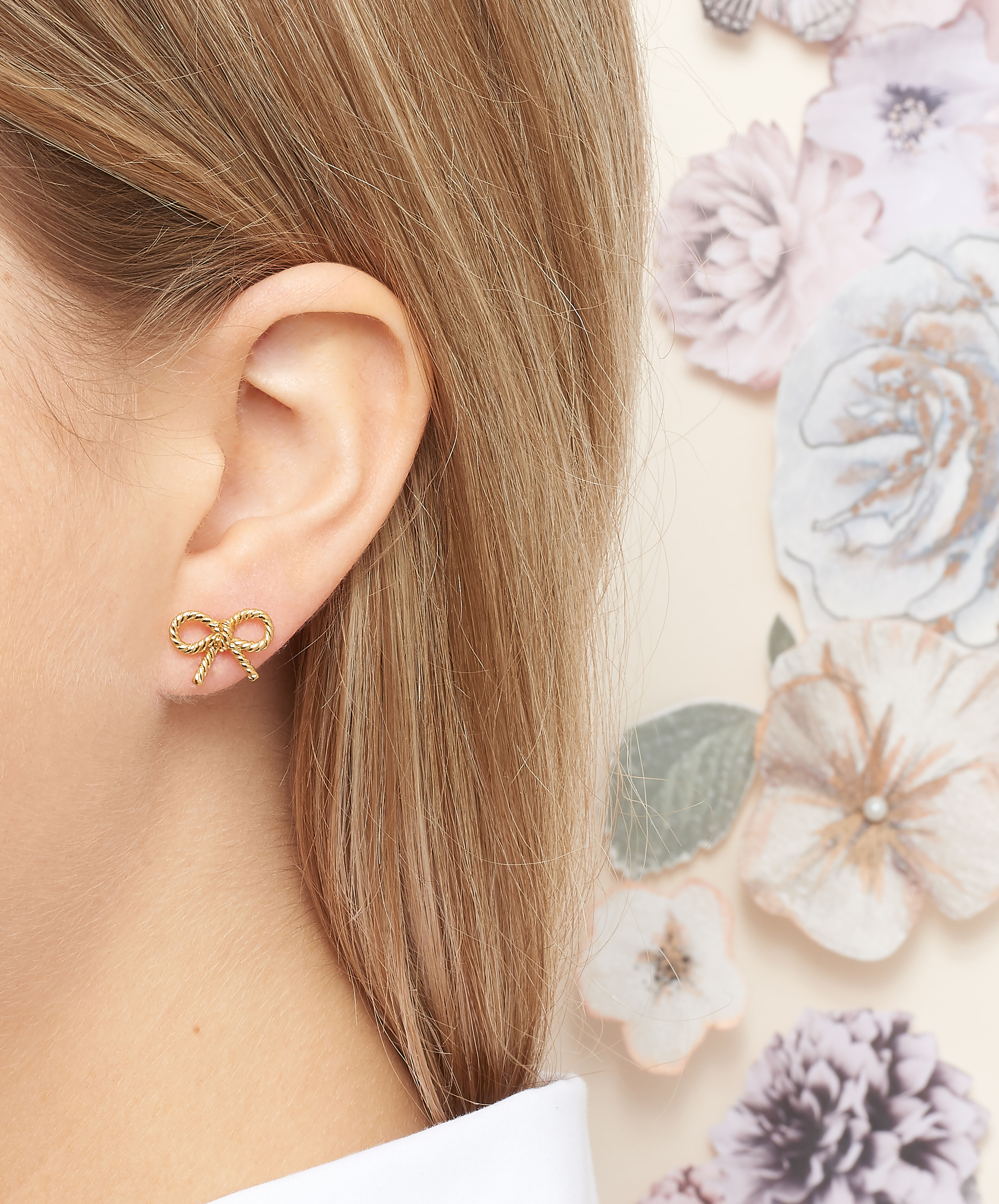 Olivia burton bow earrings top